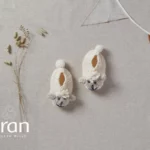 Pantöffelchen für Babies mit Schafmotiv